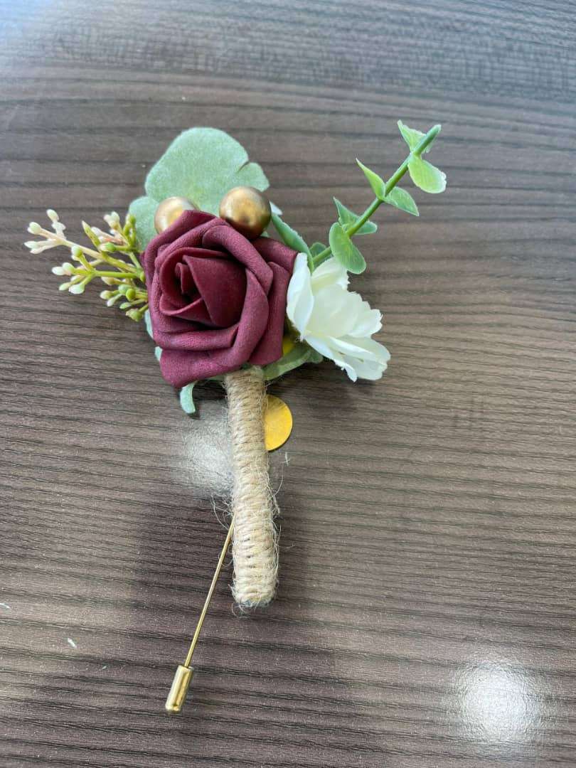 Burgundy rose boutonniere